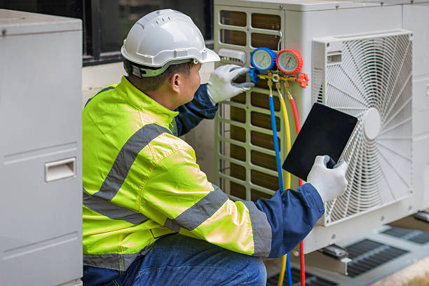 Professional Air Duct Cleaning technician working in Rigby, ID